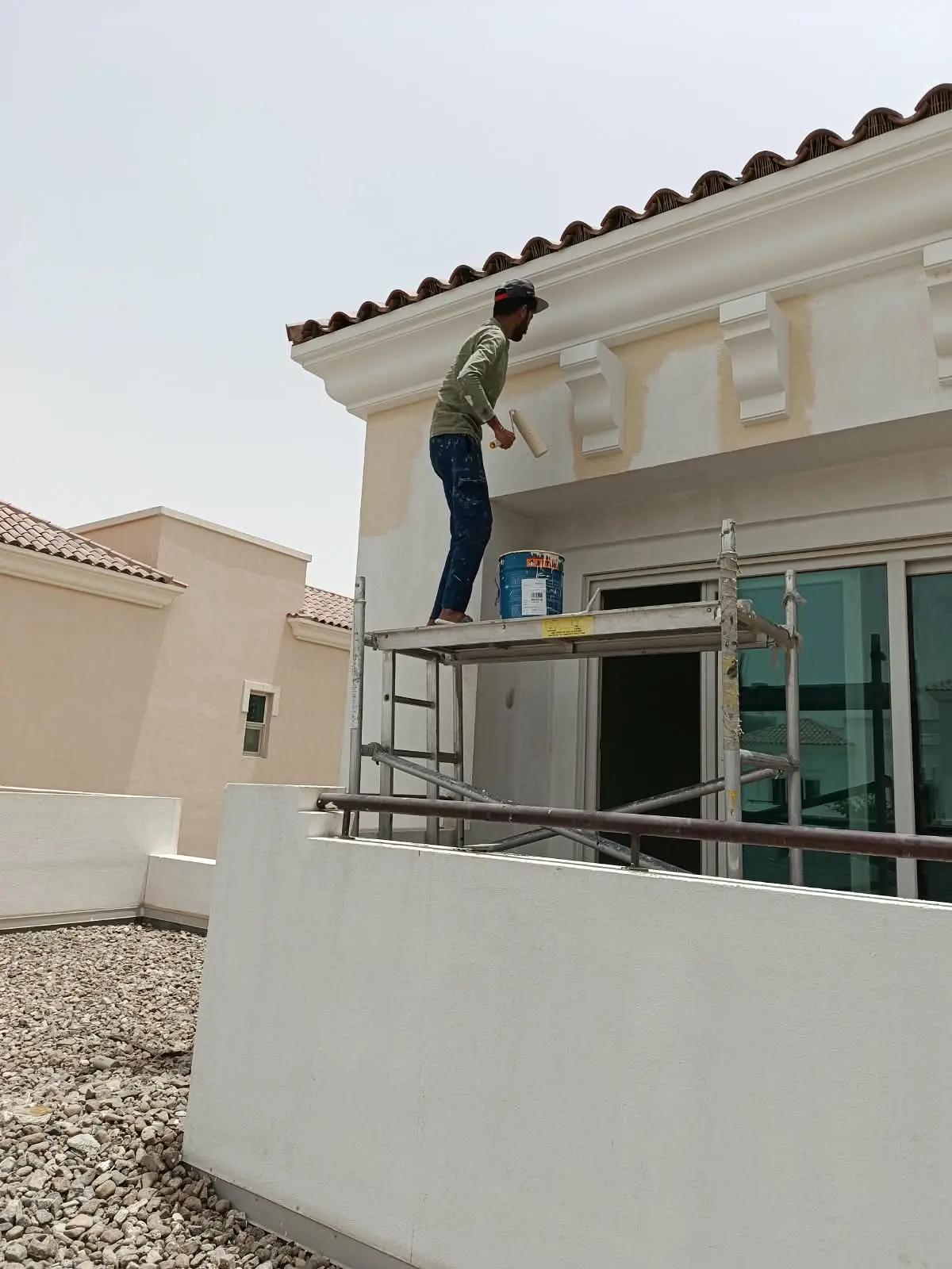 Team offerig Home painting services in Dubai