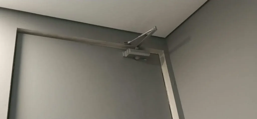 Shop Maintenance in Marina Mall Dubai 9 Auto door closer repaired by smart hands at marina mall dubai