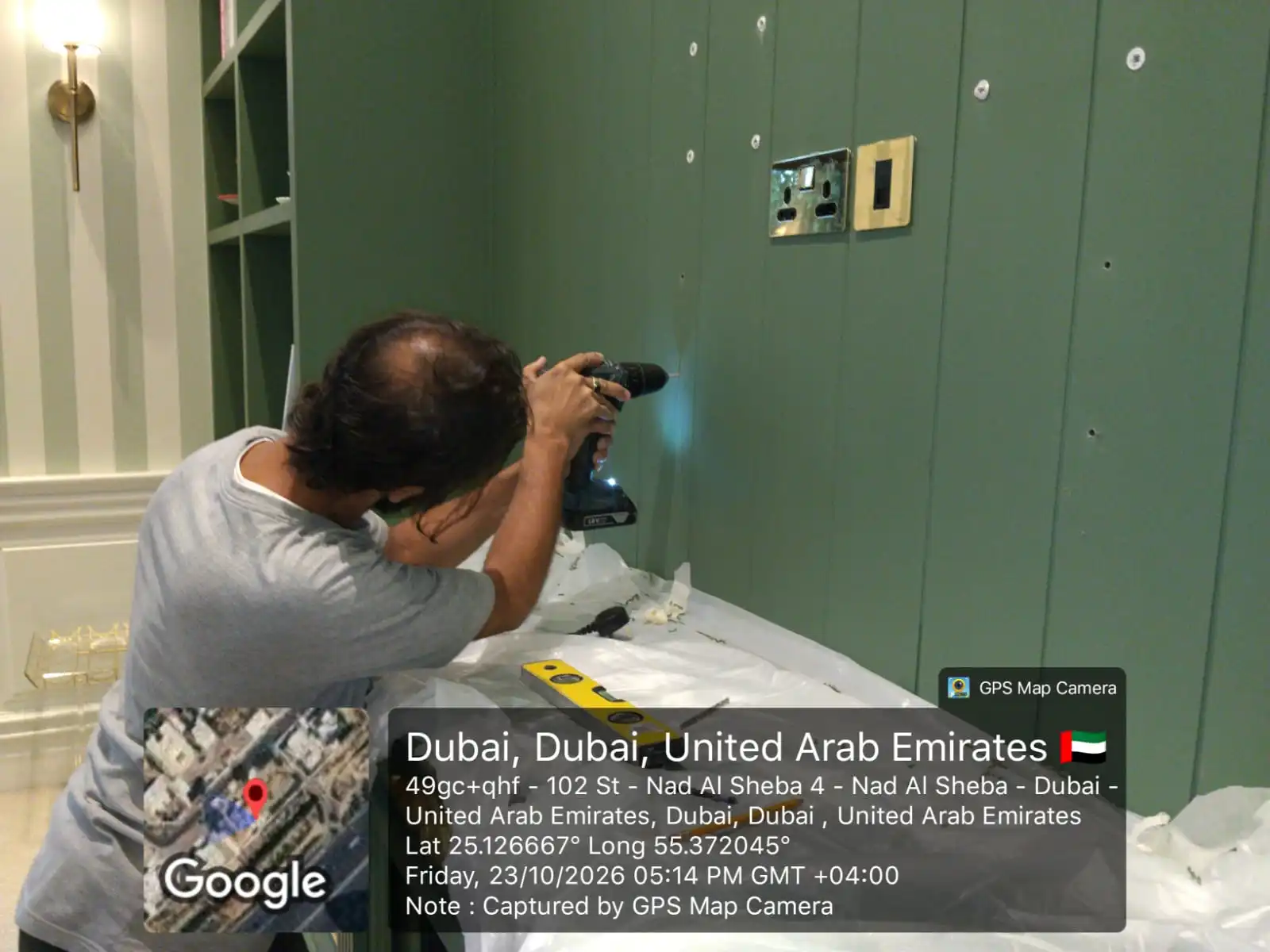 drilling to mount tv on tv panel in nad al sheba