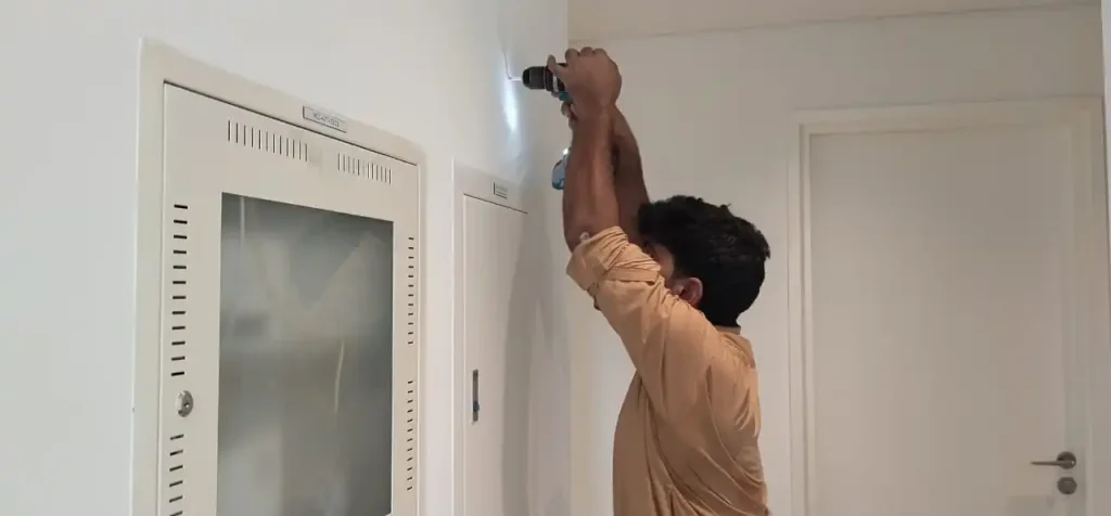 handyman on job in burj crown